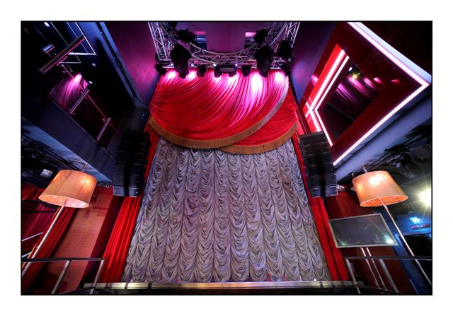 Front of House curtains in place on the stage at the Wright Venue